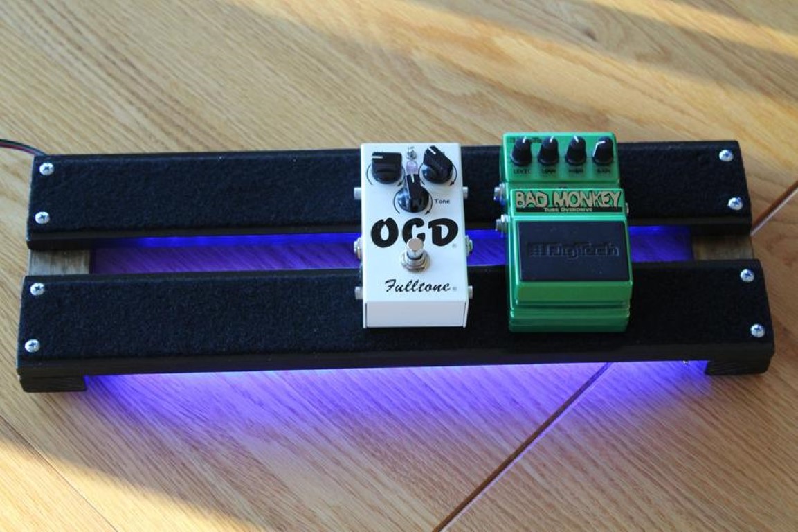 Top view of the Under-Glowed 18x6inch PedalBoard with Fulltone OCD and bad monkey pedals
