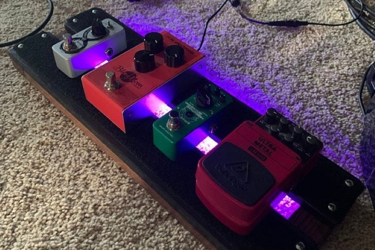 Angle view of a fully working Under-Glowed 18x6inch PedalBoard